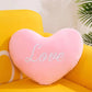 Heart-shaped throw pillow